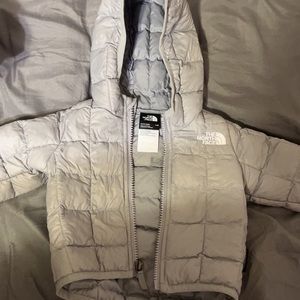 Gray north face, infant 0-3 Brand new